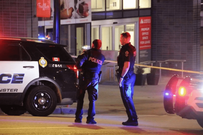New Westminster police officers at the scene of a late-night stabbing investigation near Columbia Street.