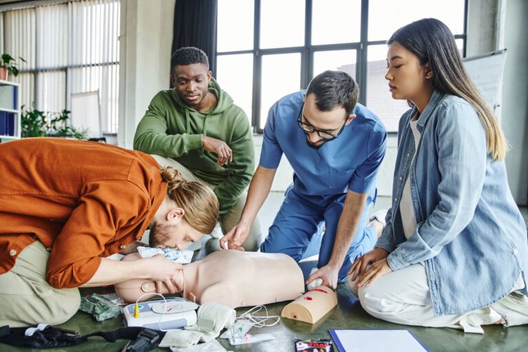young-man-practicing-artificial-respiration-on-cpr